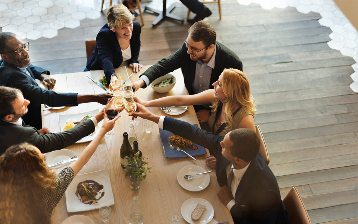 business leadership team celebration restaurant